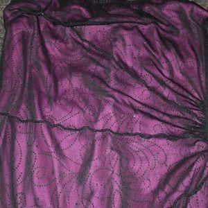 A glittery purple black pink dress